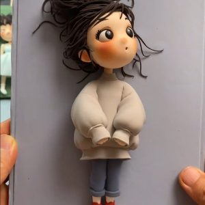 The Girl in the Oversized Gray Sweater